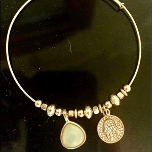 Gold and light green stone bangle.